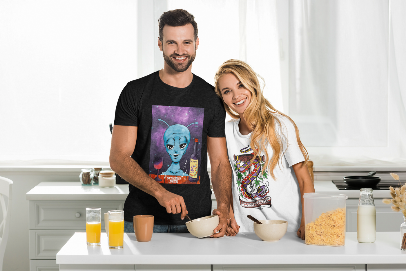 Beautiful young couple preparing breakfast in their home kitchen wearing Vino Tees T shirts.